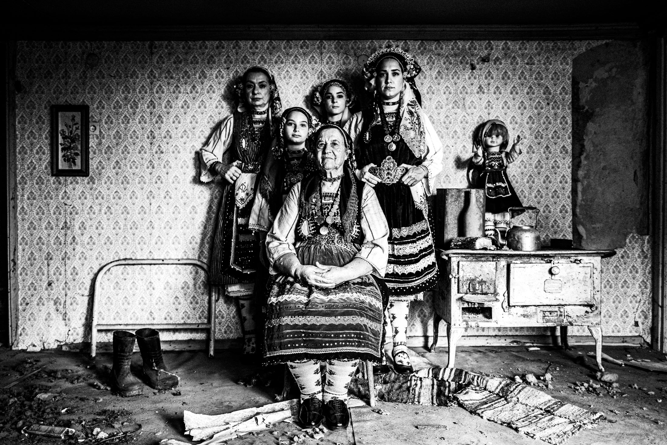 Women wearing the local costume of Metaxades, inside a local house. Evros, Thrace