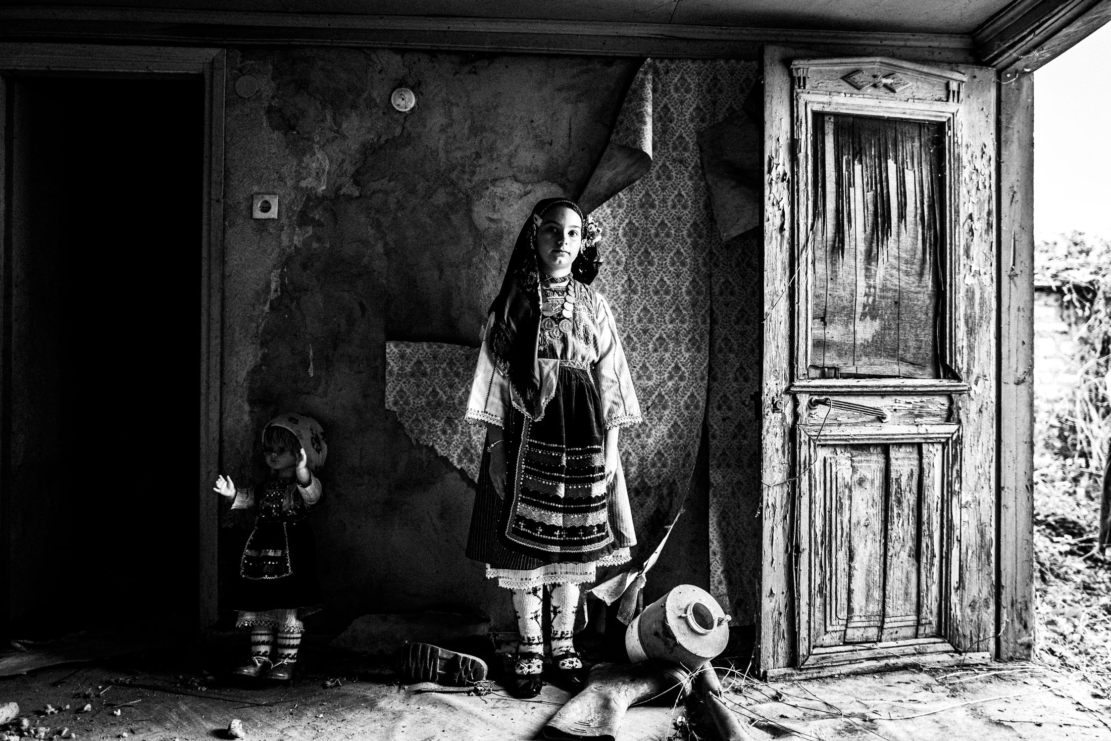Woman wearing the local costume of Metaxades, inside a local house. Evros, Thrace