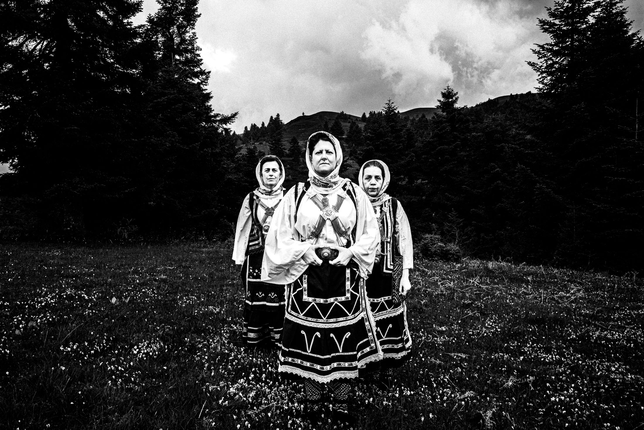 Women wearing the costumes of Sarakatsani in a forest in Karpenissi, Evrytania