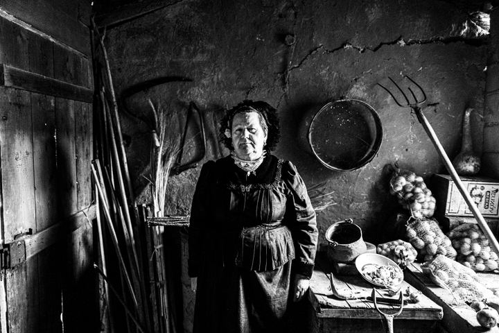 Woman wearing the local costume of Nea Vyssa, inside a local house. Evros, Thrace, Greece