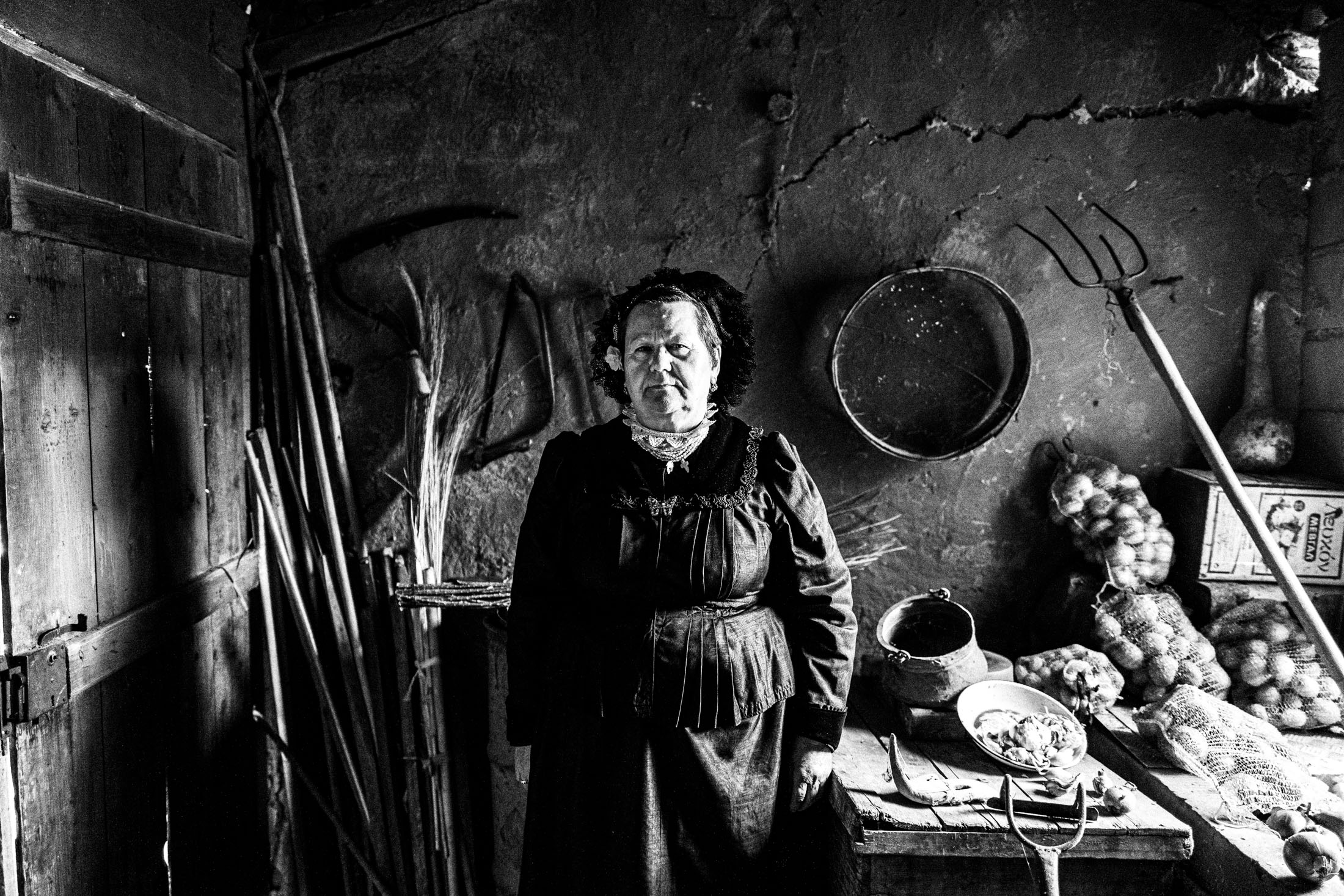 Woman wearing the local costume of Nea Vyssa, inside a local house. Evros, Thrace, Greece