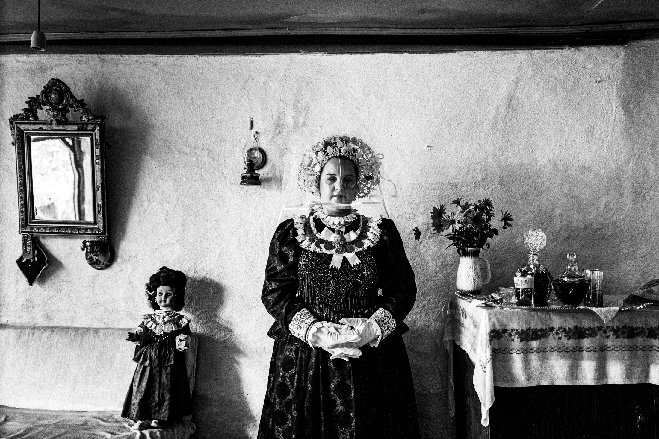Woman wearing the local costume of Nea Vyssa, inside a local house. Evros, Thrace, Greece