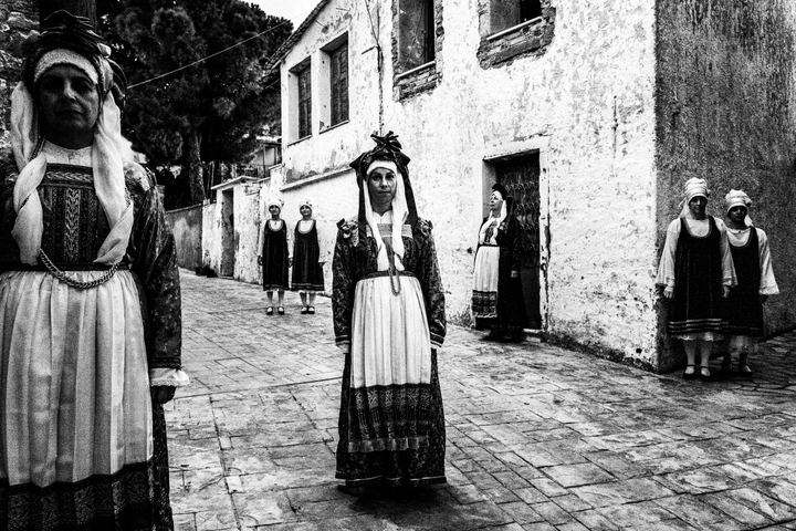 Women posing in the village of Neochori, wearing the local traditional costumes, Chios.
