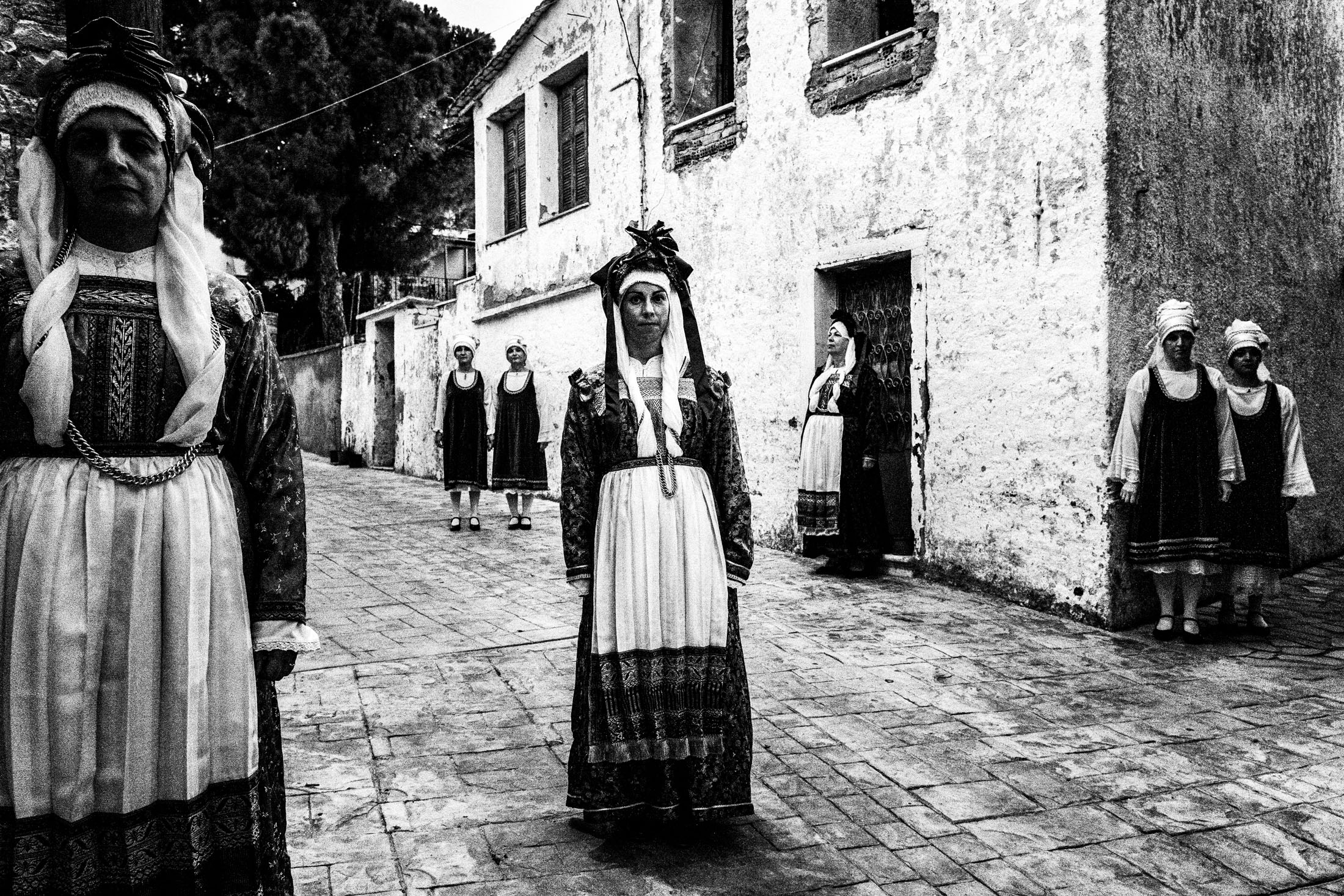 Women posing in the village of Neochori, wearing the local traditional costumes, Chios.