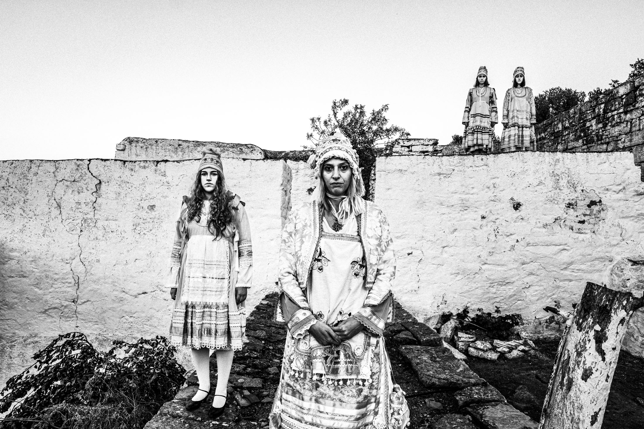 Women wearing the local costumes of Thymiana at a local monastery