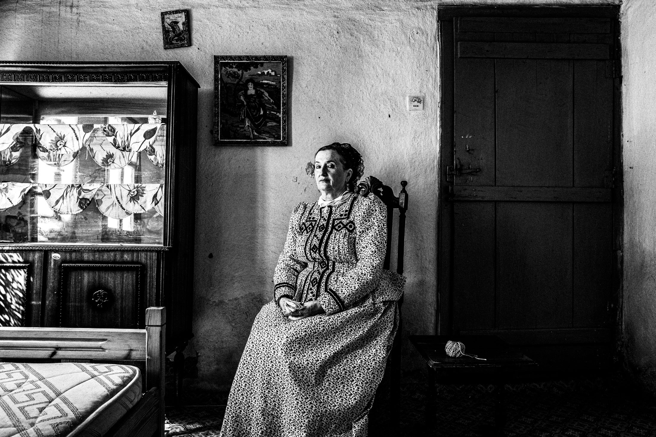 Woman wearing the local costume of Nea Vyssa, inside a local house. Evros, Thrace, Greece
