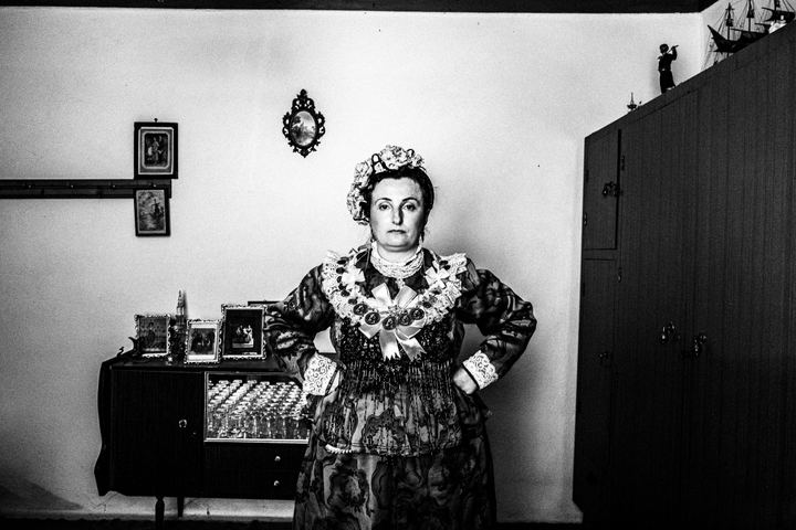 Woman wearing the local costume of Nea Vyssa, inside a local house. Evros, Thrace, Greece