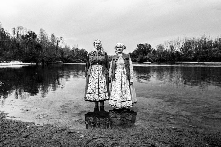 Woman wearing the local costume of Nea Vyssa, in Ardas River. Evros, Thrace, Greece