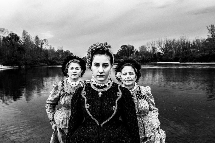 Woman wearing the local costume of Nea Vyssa, in Ardas River. Evros, Thrace, Greece