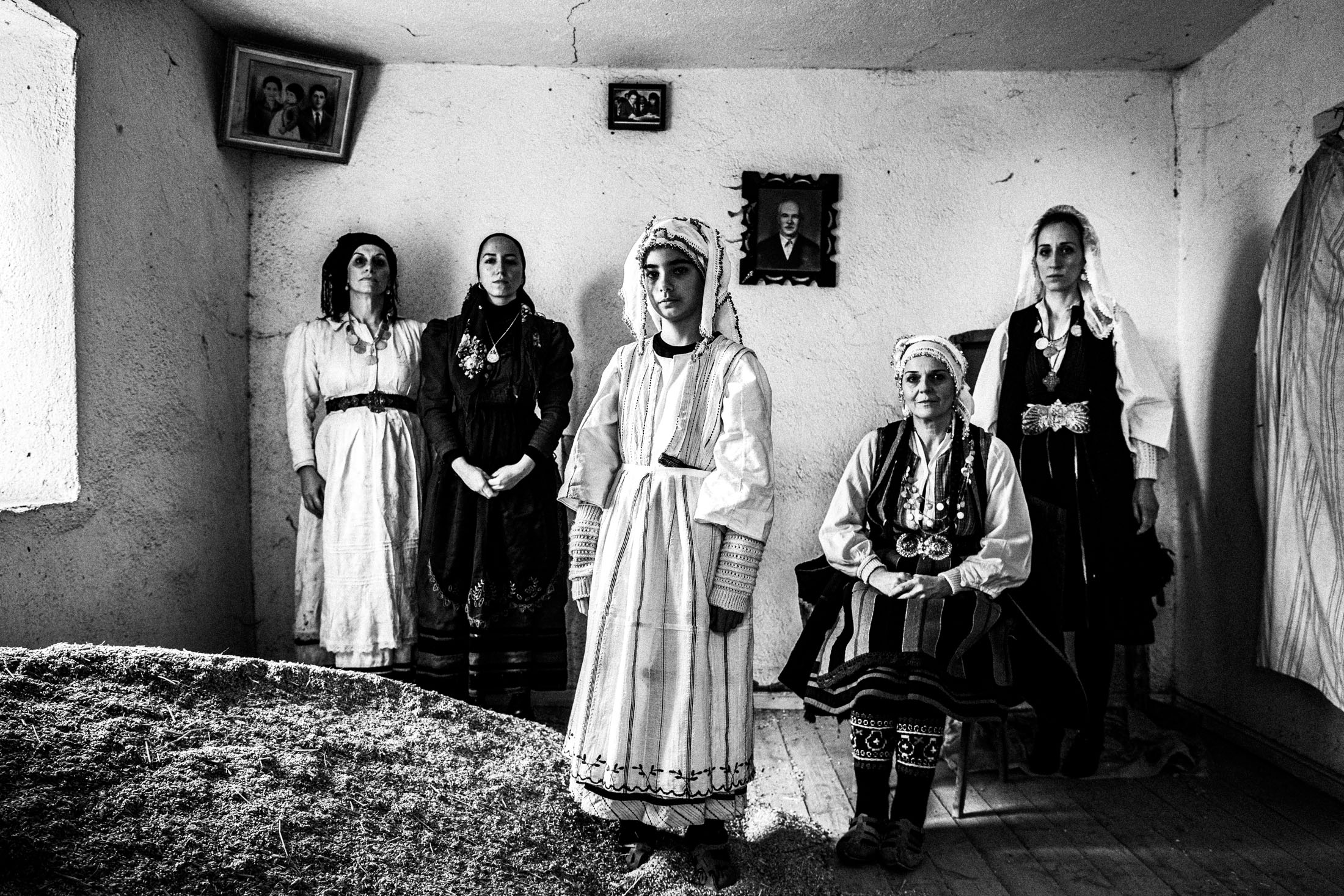A group of women wearing the costumes of Ermakia near Ptolemaida, inside an old local house