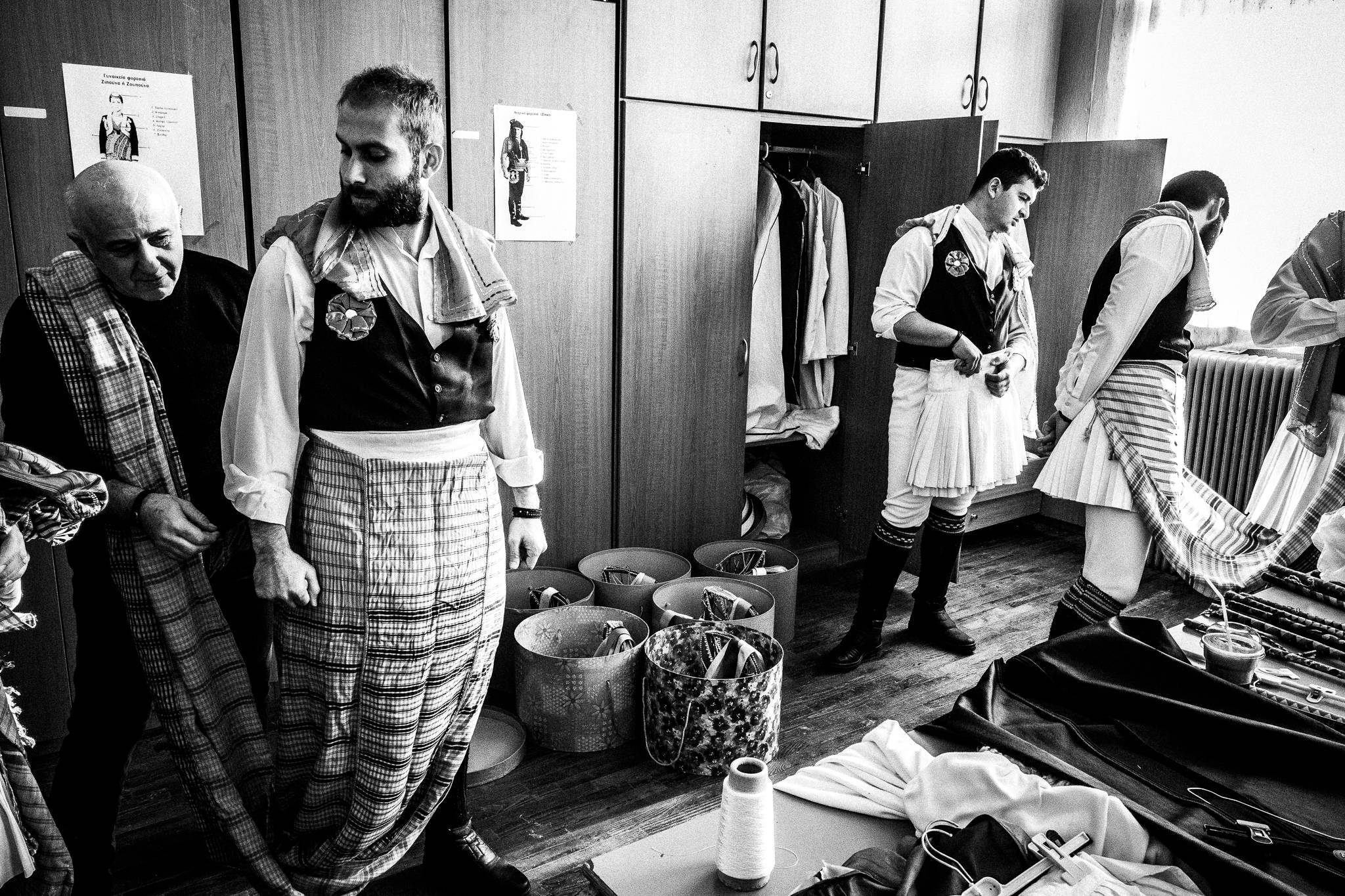 Participants preparing their traditional Kotsamania costumes at the cultural society.