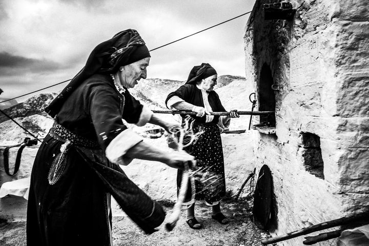 Black-and-white photograph from Byzantine Easter of Olympos, Olympos, Karpathos.