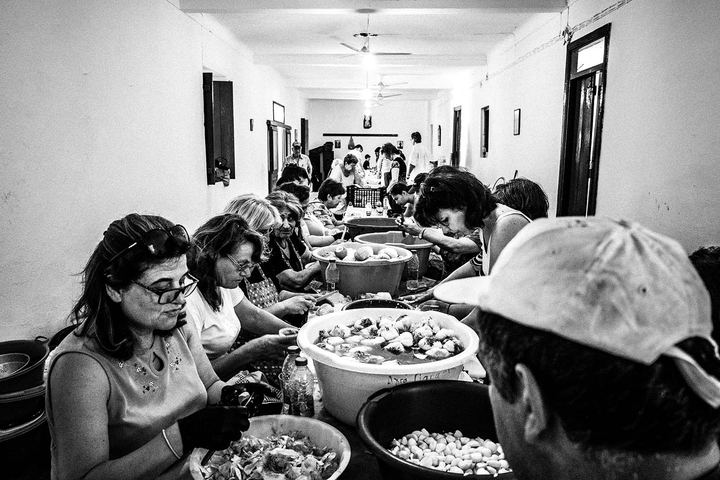 Volunteers preparing dinner during the festival of Agia Paraskevi on Amorgos