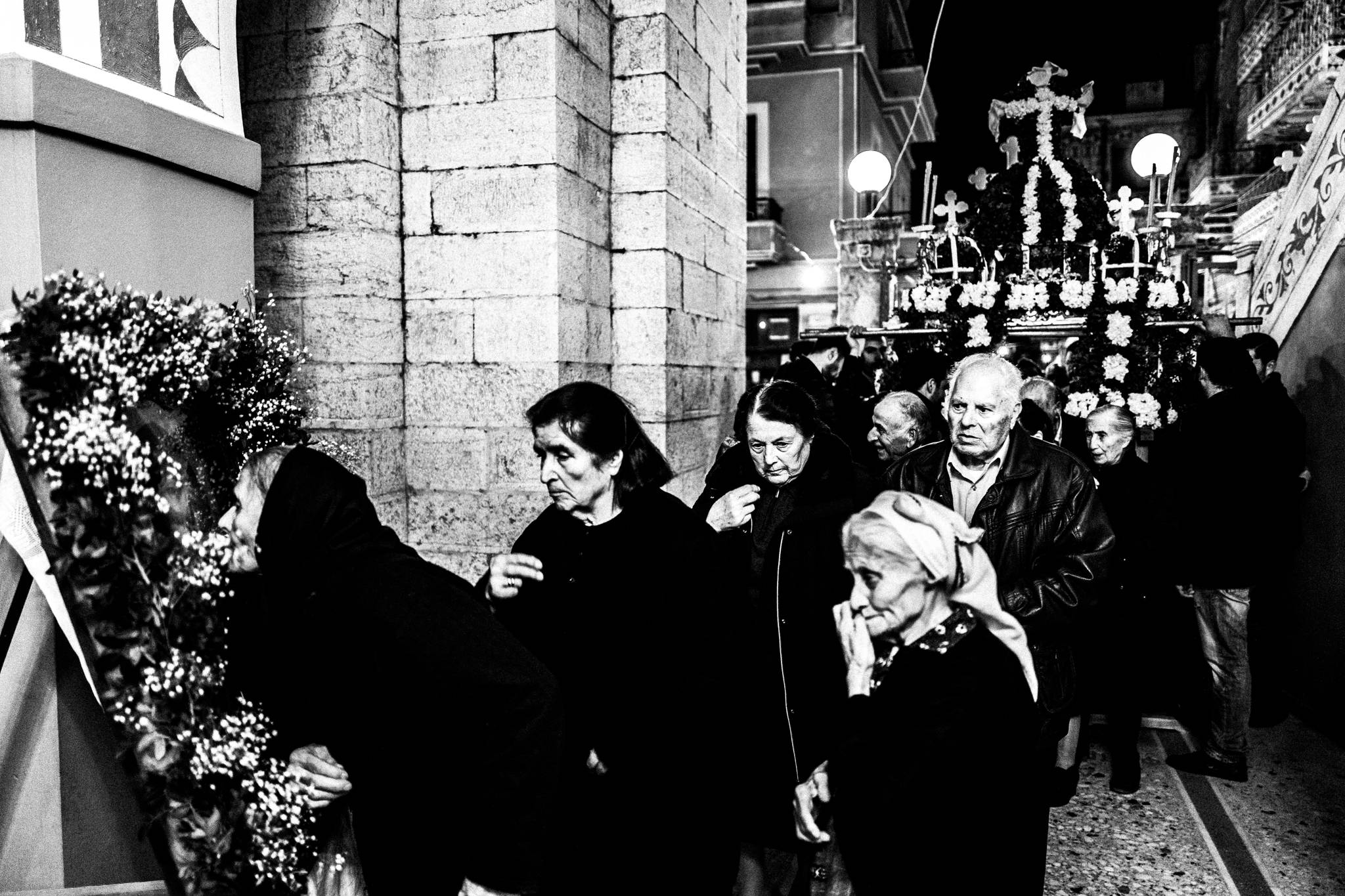The nighttime Epitaph procession moving through Pyrgi on Good Friday.