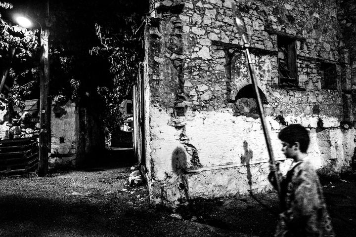 The Good Friday procession moving through the alleys of Kastellorizo.