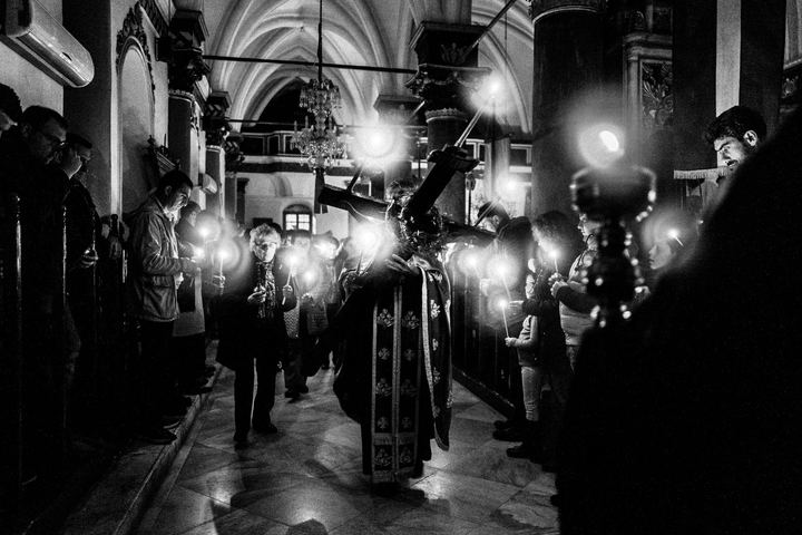 Holy Thursday service with the Crucified Christ inside the church of Kastellorizo.