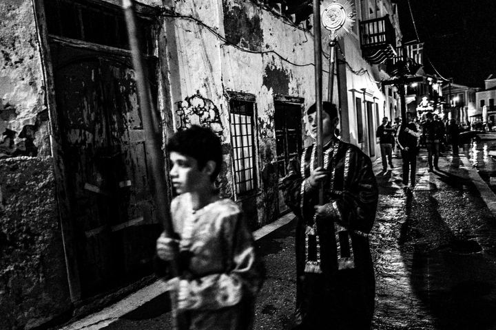 Children carrying candles at the head of the Epitaph procession in Kastellorizo.