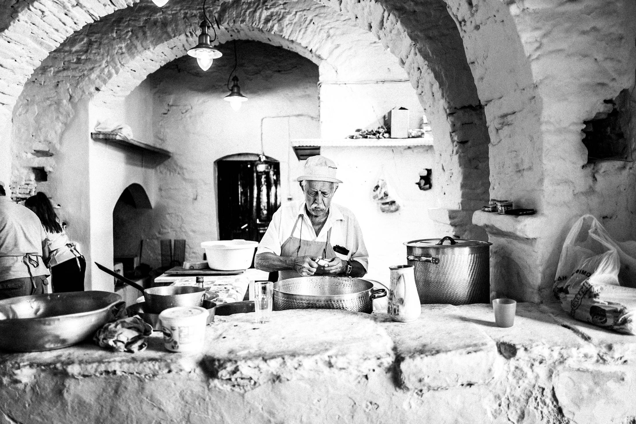 Cooks preparing food inside the Prophet Elias monastery.
