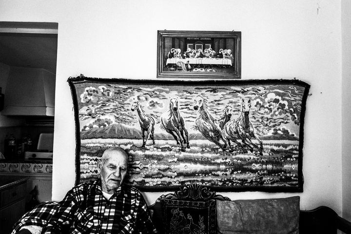 Traditional winemaker Nikolaos Drossos outside his home.