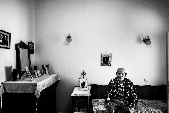 Portrait of an elderly traditional winemaker on Santorini.