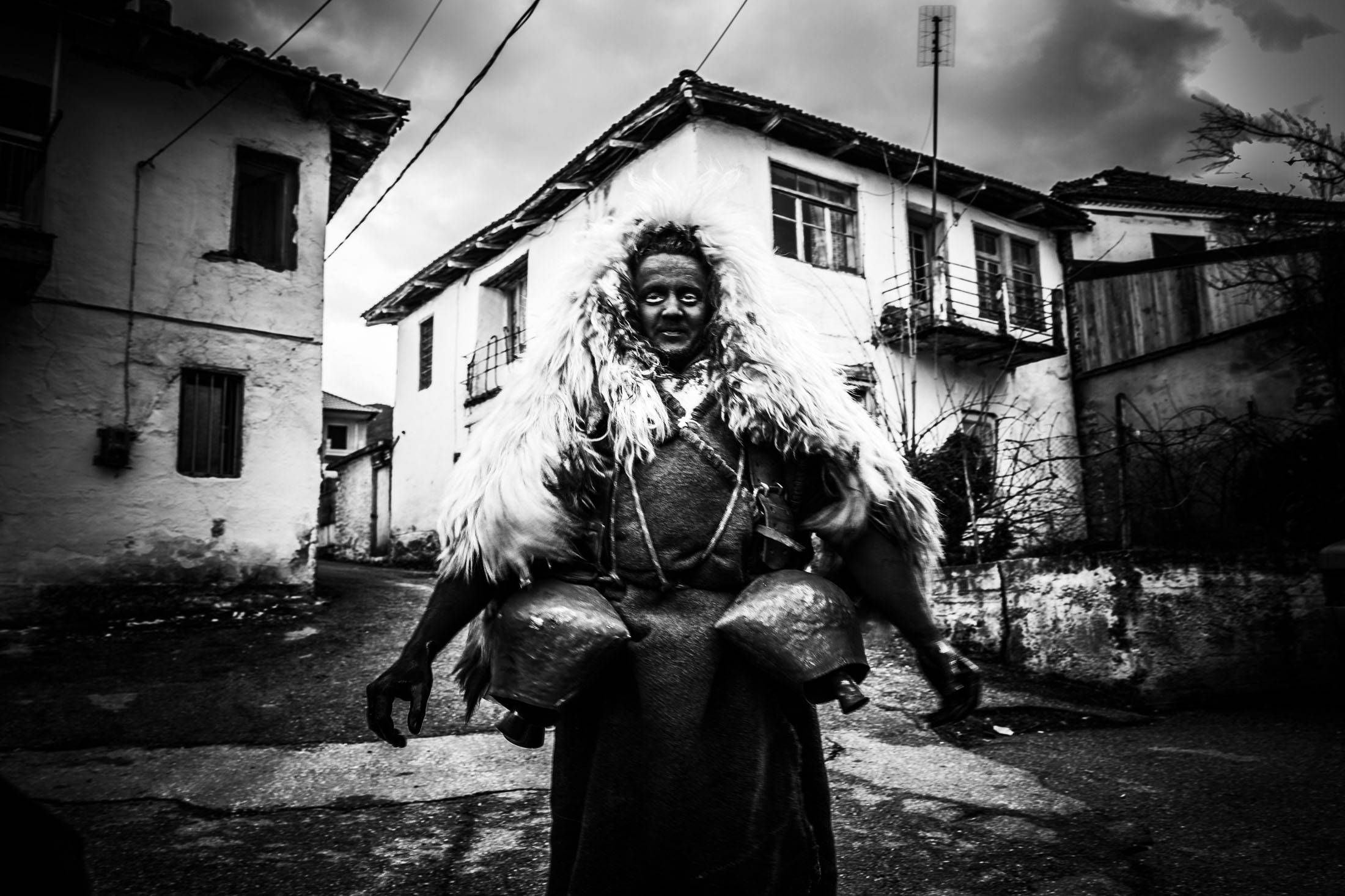 A man dressed in an animal-like costume at Volax, Drama