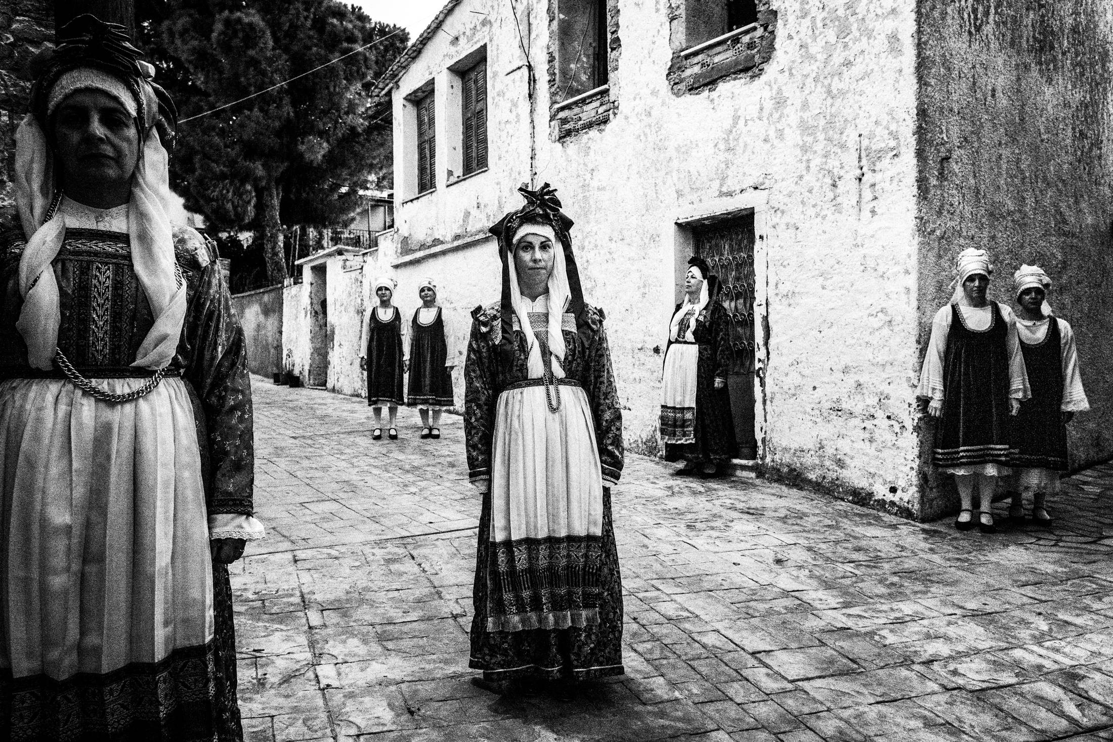 Women posing in the village of Neochori, wearing the local traditional costumes, Chios.