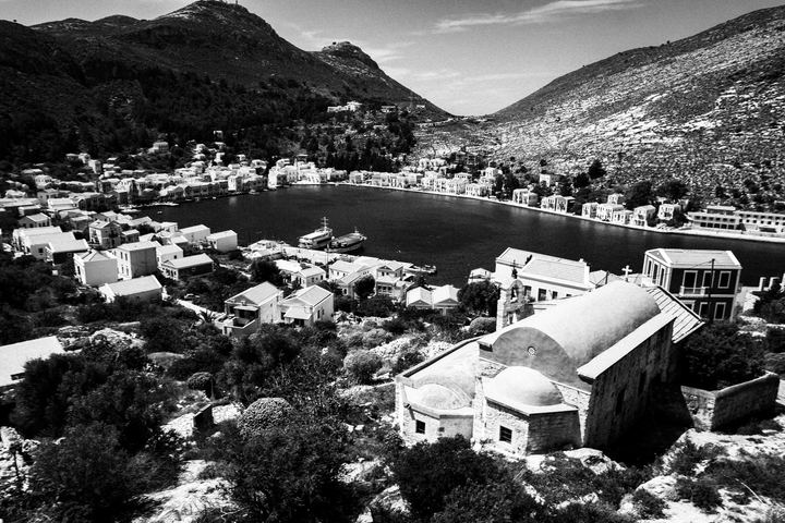 Black and white photograph of Megisti and the harbour of Kastellorizo.