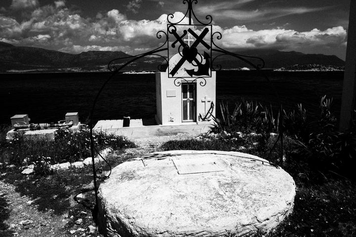Black and white photograph of a small chapel in Mandraki, Kastellorizo.