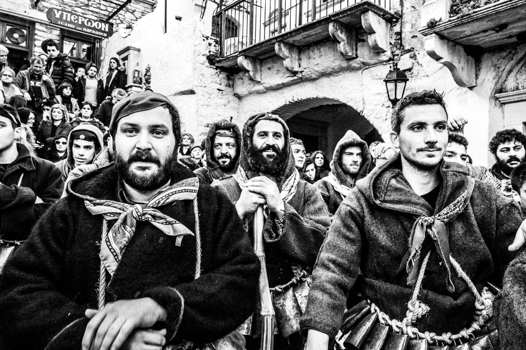 A group of Koudounatoi moving through the Carnival crowd in Apeiranthos.