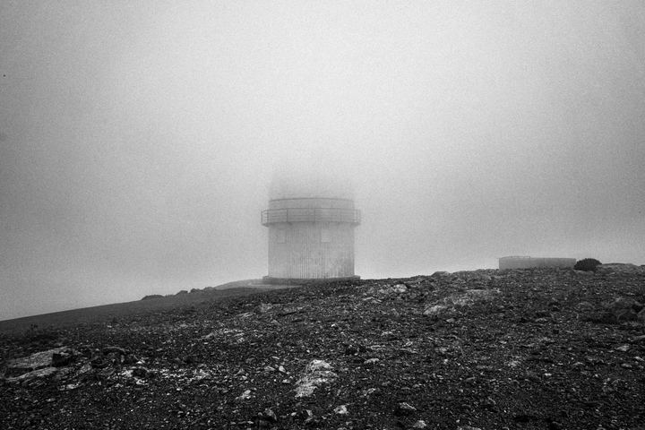 Black and white photograph of the Skinakas Observatory in the mountains of Psiloritis above Anogia, Crete.