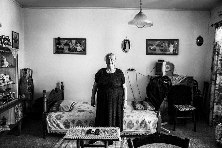 Black-and-white photograph of Captain Irene at her place on Kalymnos.