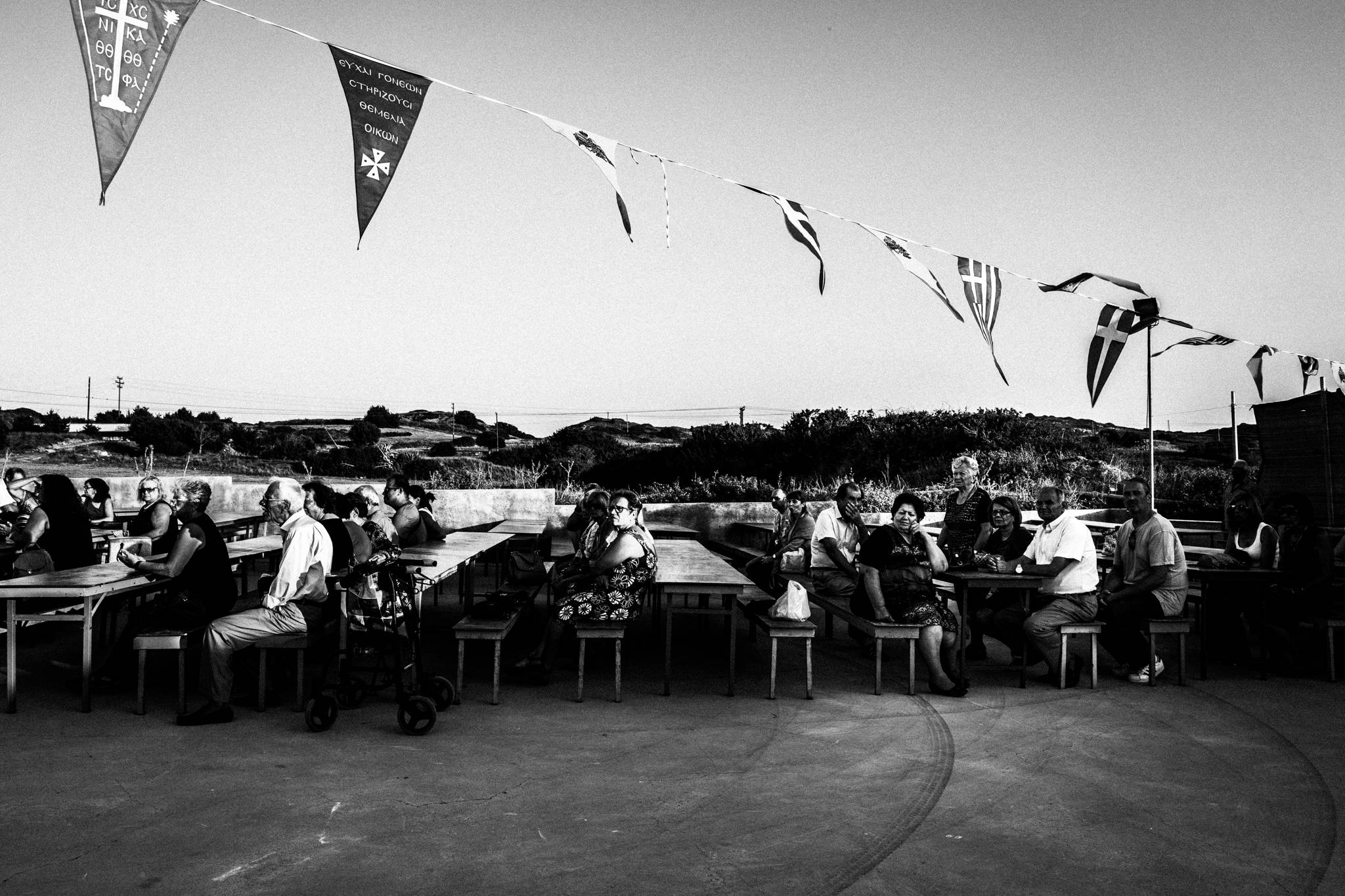 Priests and worshippers during the evening service of Saint Fanourios near Mastichari.